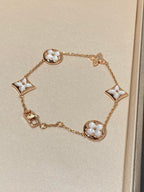 ??Loco?¡¥STAR AND SUN 5 MOTIF MOP PINK GOLD BRACELET