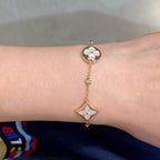 ??Loco?¡¥STAR AND SUN 4 MOTIF WHITE MOP PINK GOLD BRACELET
