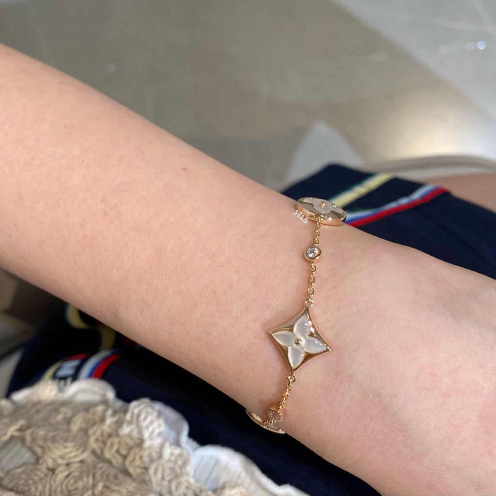 ??Loco?¡¥STAR AND SUN 4 MOTIF WHITE MOP PINK GOLD BRACELET