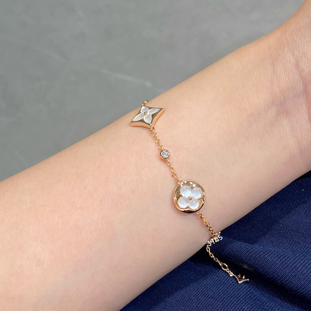 ??Loco?¡¥STAR AND SUN 4 MOTIF WHITE MOP PINK GOLD BRACELET