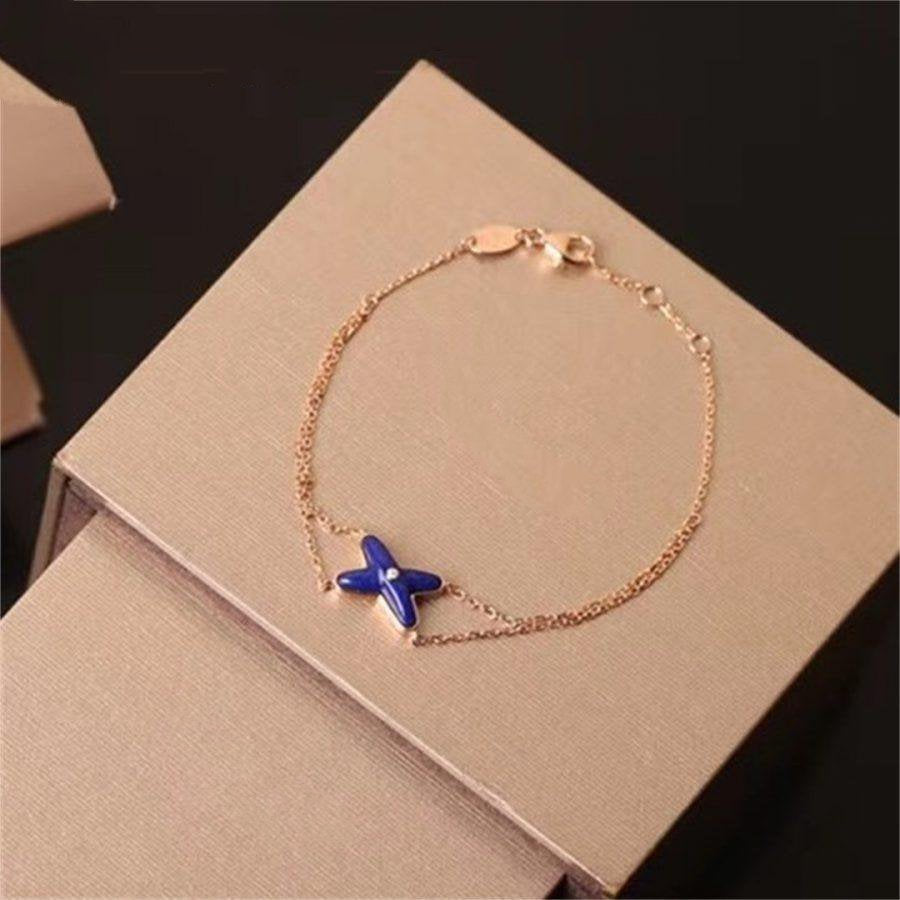??Loco?¡¥Hollow Design Four-Leaf Clover Flower Shape Ring