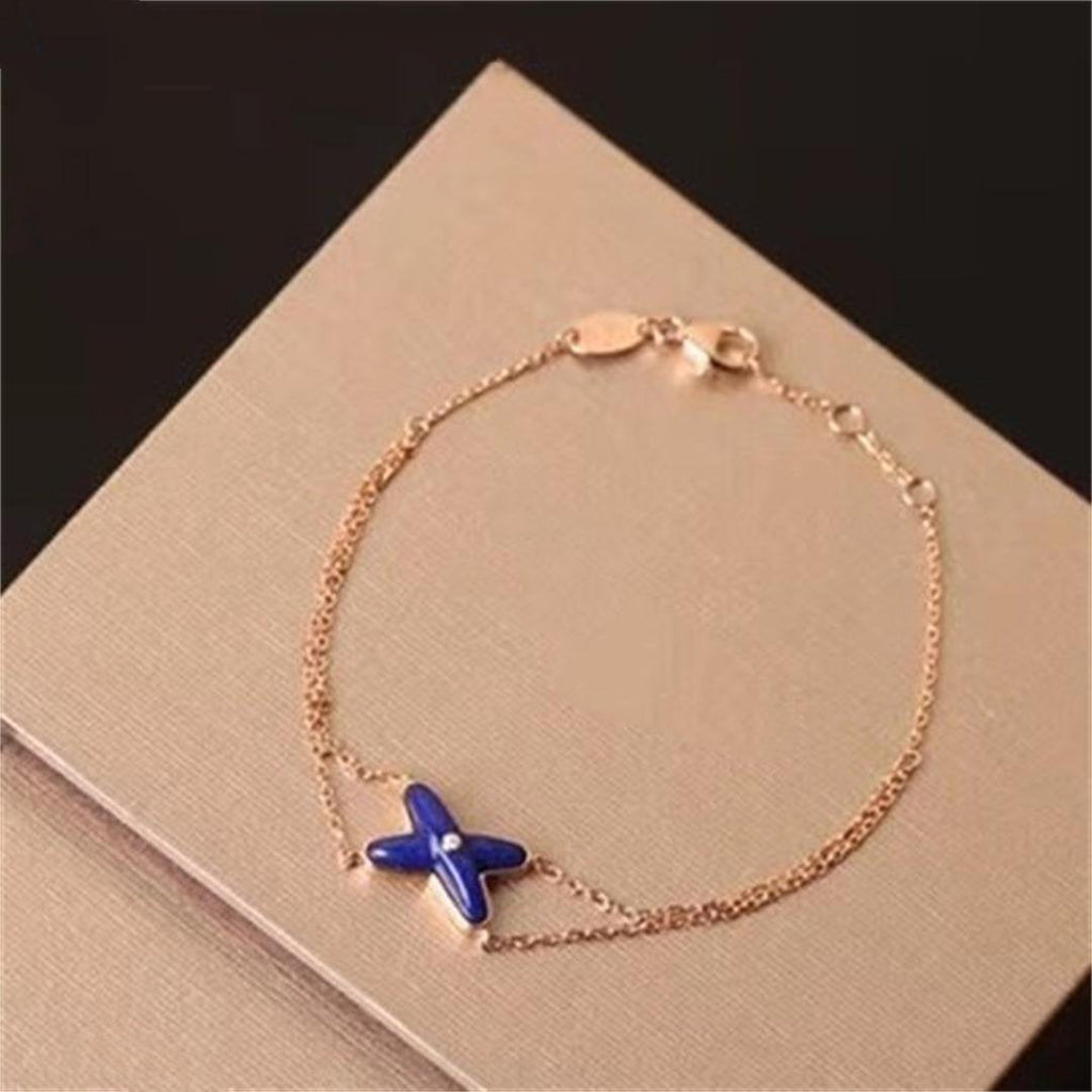 ??Loco?¡¥Hollow Design Four-Leaf Clover Flower Shape Ring